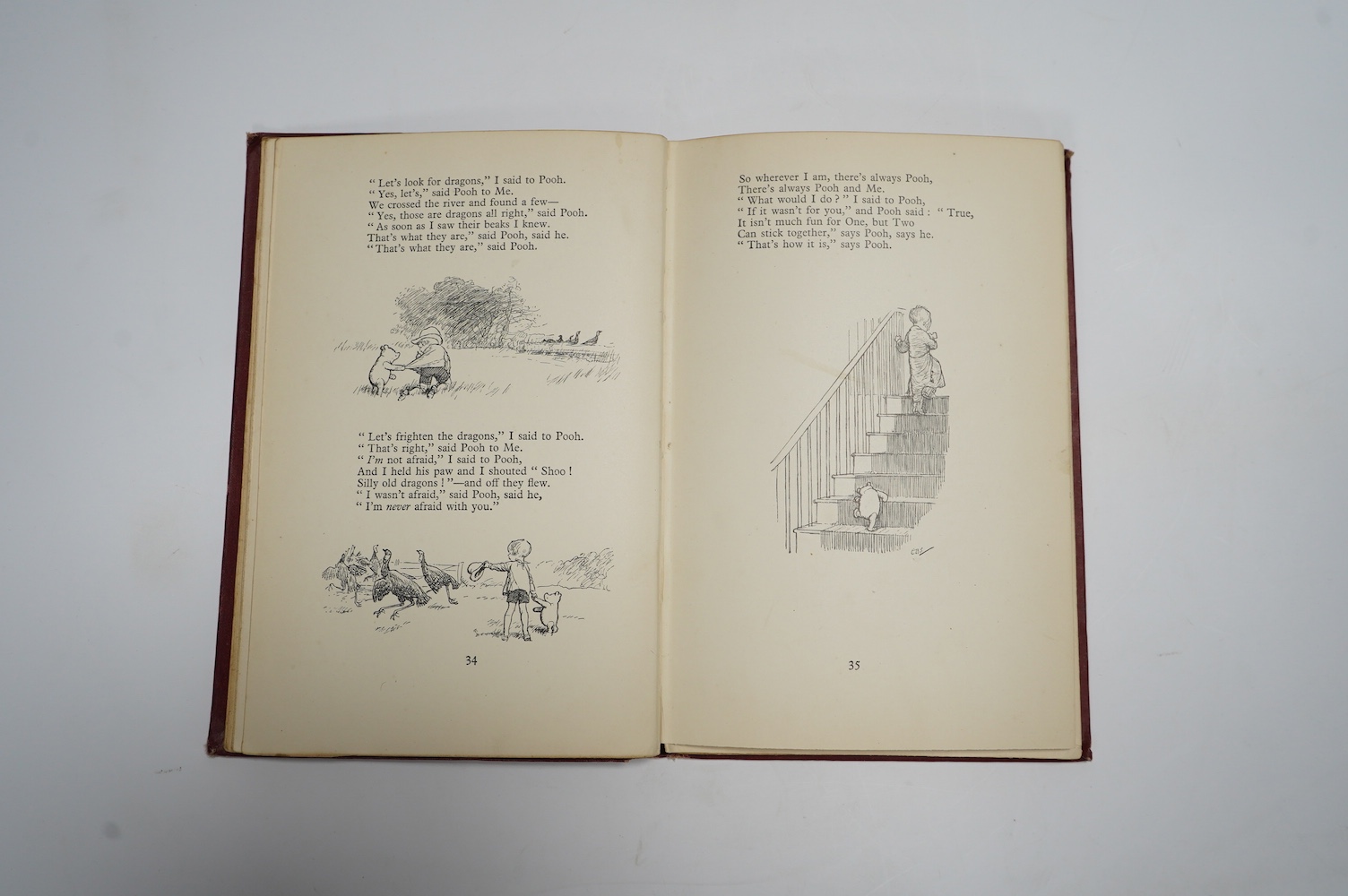 Milne, A.A. - Now We Are Six. with decorations by Ernest H. Shepard. First Edition title and other illus. throughout, and on e/ps.; publisher's gilt ruled and pictorial red cloth, gilt top, sm.8vo. Methuen, 1927